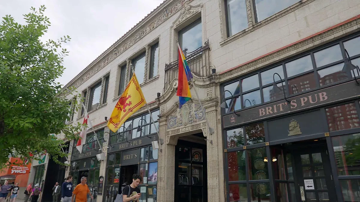 Brit's Pub exterior on Nicollet Mall with flags and sidewalk