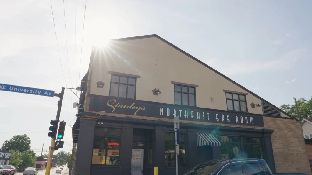 Exterior of Stanley's Northeast Bar Room on a bright, sunny day.