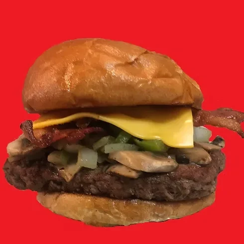 Close-up hamburger: brioche bun, grilled patty, melted cheese, bacon, mushrooms.