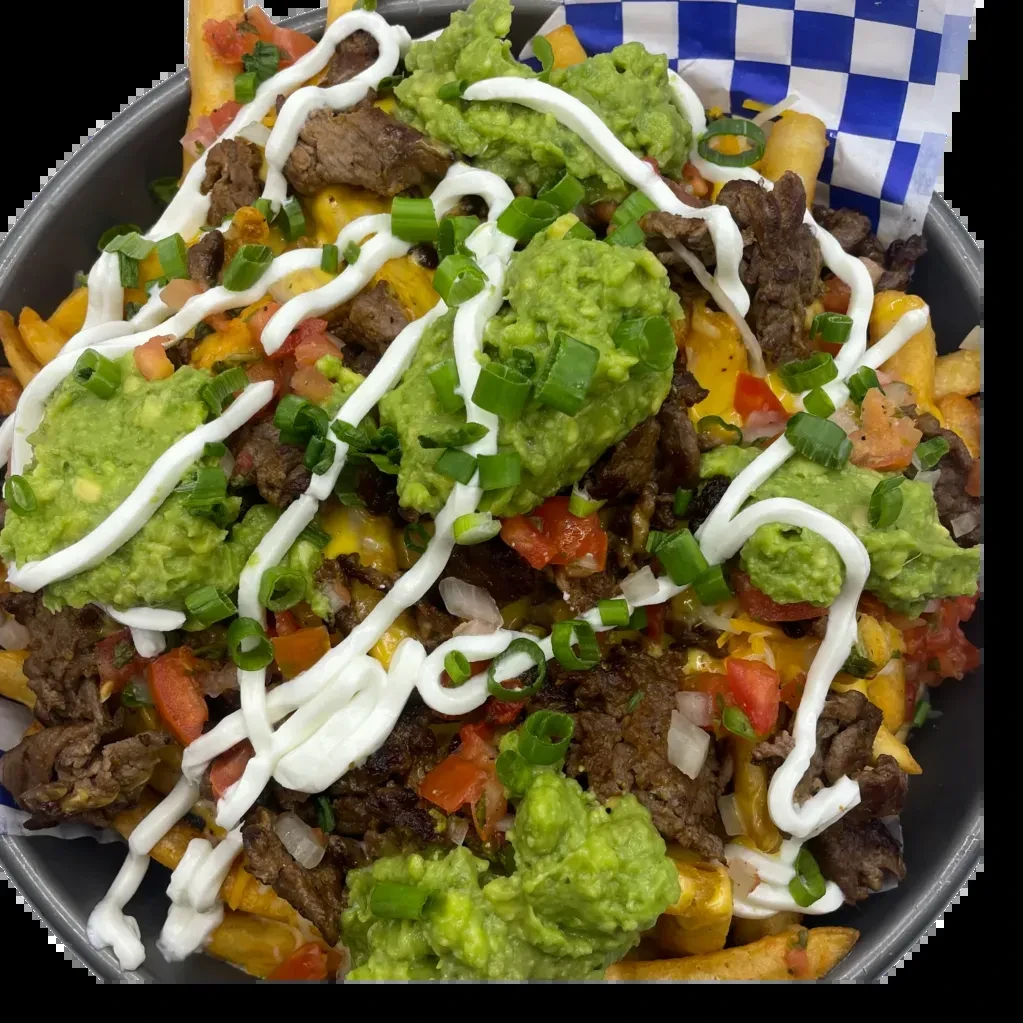 Loaded fries with cheese, meat, pico, guacamole, and sour cream.