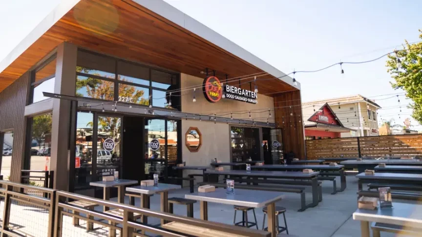Modern Dog Haus Biergarten restaurant exterior with empty patio.