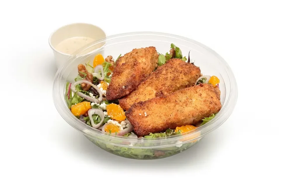 Takeout breaded chicken salad with mandarin, cheese, walnuts, and dressing.