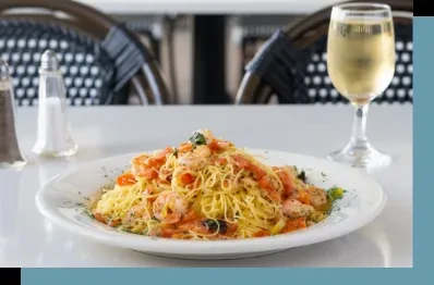 Pasta with shrimp and tomatoes, white wine, salt and pepper.