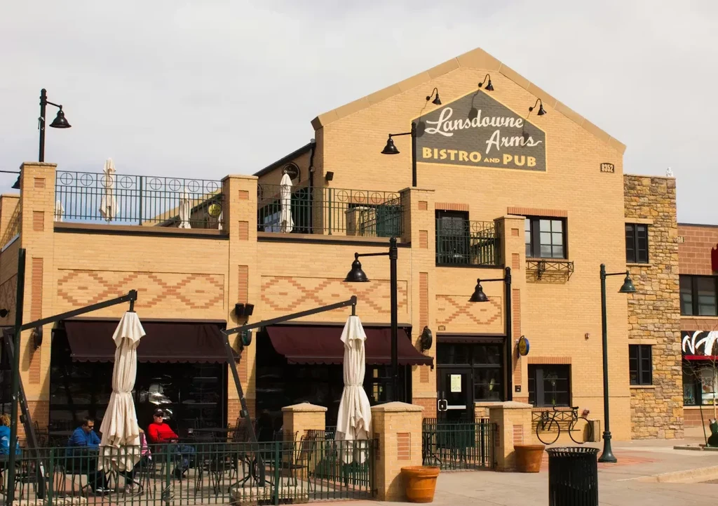 Lansdowne Arms Bistro and Pub, a brick building with two patios.