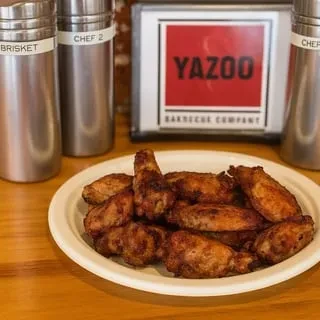 Plate of crispy chicken wings at Yazoo Barbecue Company.