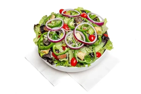 Fresh salad with mixed greens, peppers, tomatoes, croutons, and cheese.