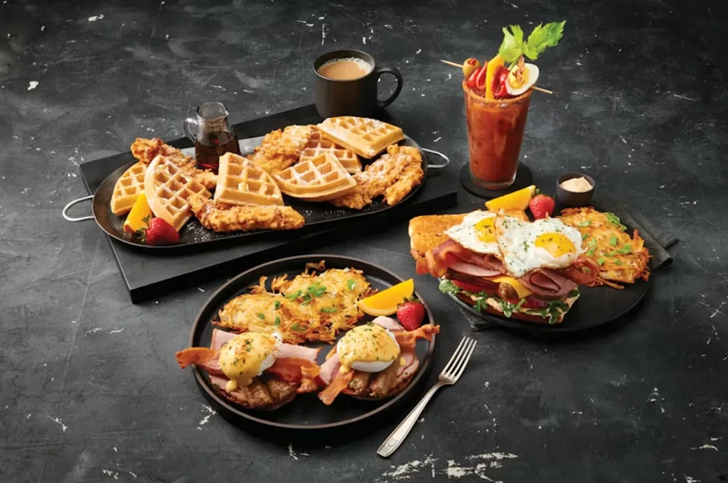 Assorted breakfast and brunch dishes, coffee, and a Bloody Mary.