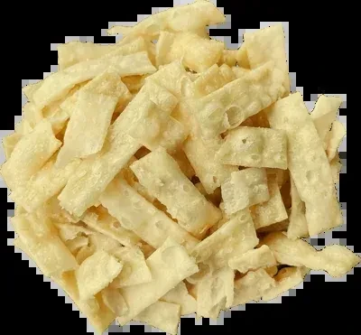 Pile of pale yellow crispy fried dough strips on black background.