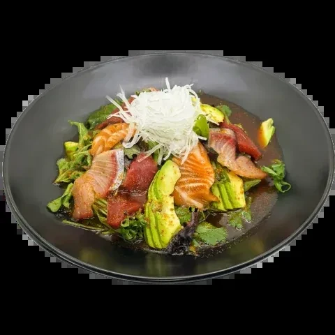 Vibrant poke bowl with salmon, tuna, avocado, greens, and shredded radish.
