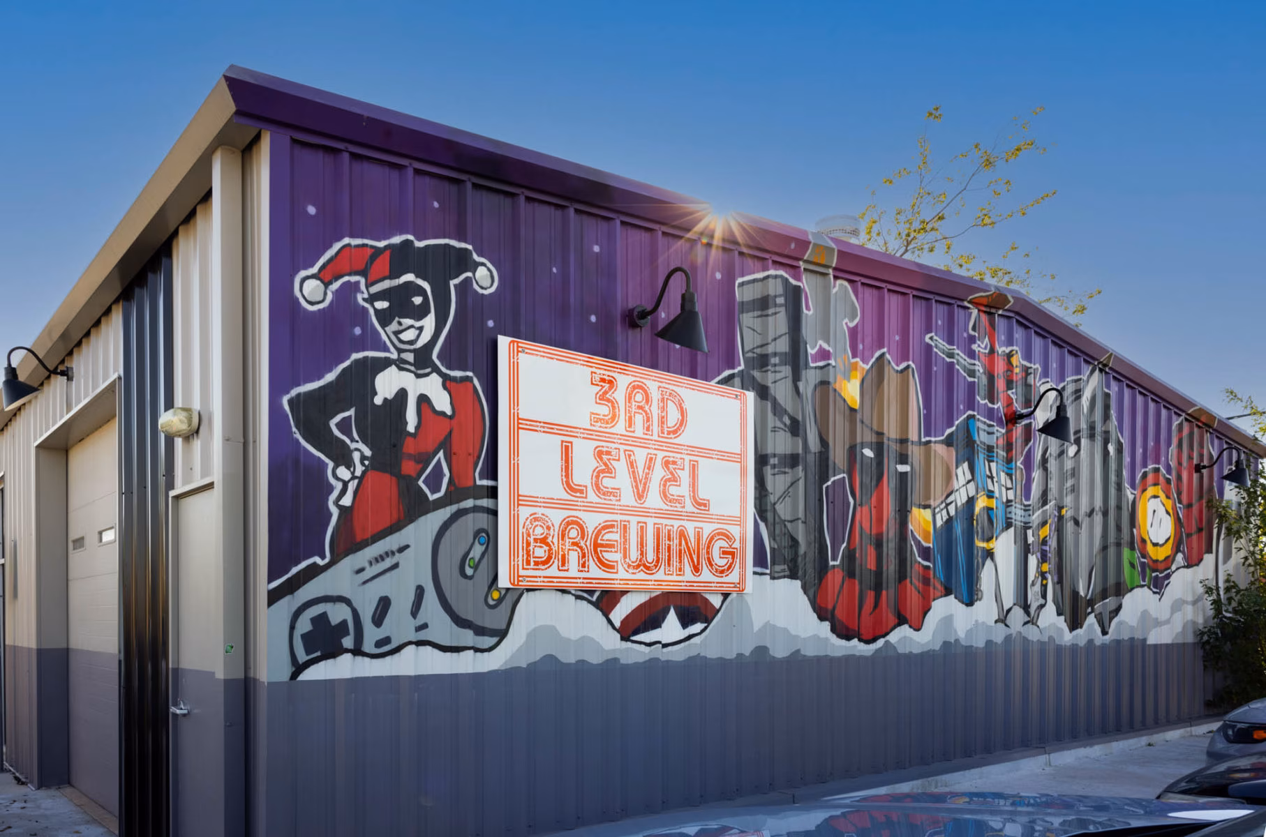 Purple building with comic character mural and '3RD LEVEL BREWING' sign.