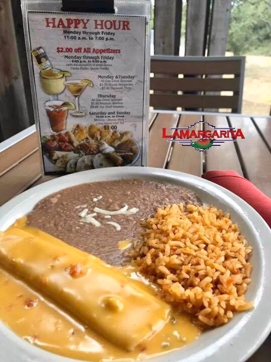 Plate of enchiladas, beans, rice, and La Margarita happy hour menu.