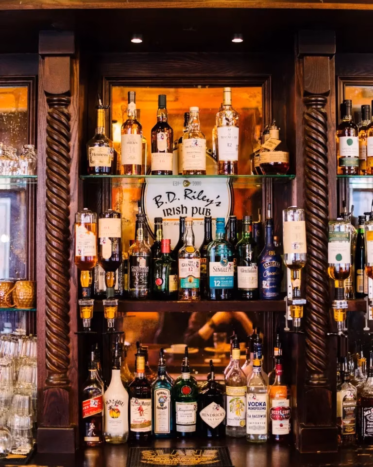 A well-stocked bar counter at B.D. Riley's Irish Pub.