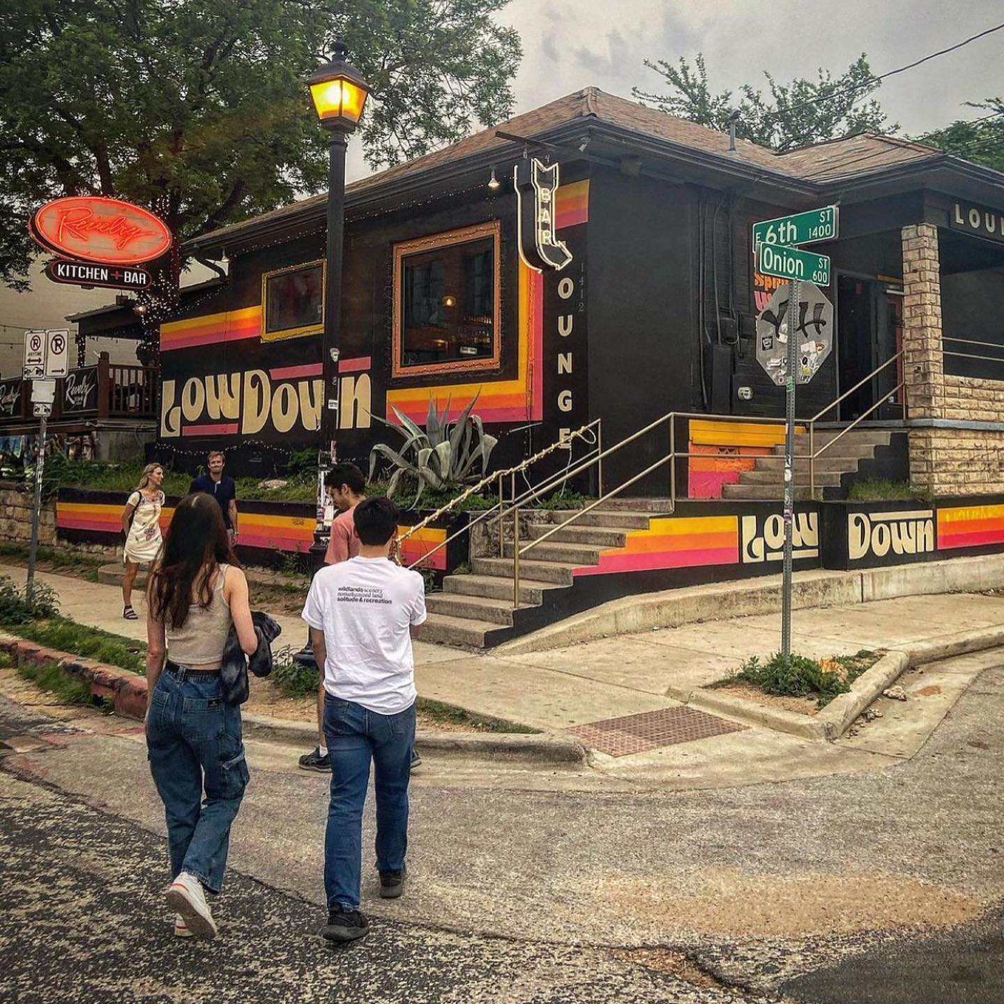 LowDown Lounge building at 6th and Onion Streets with people walking.