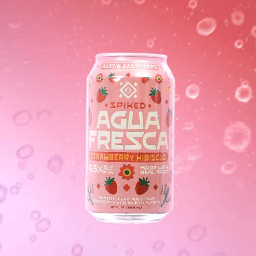 Pink Spiked Agua Fresca Strawberry Hibiscus can on bubbly background.