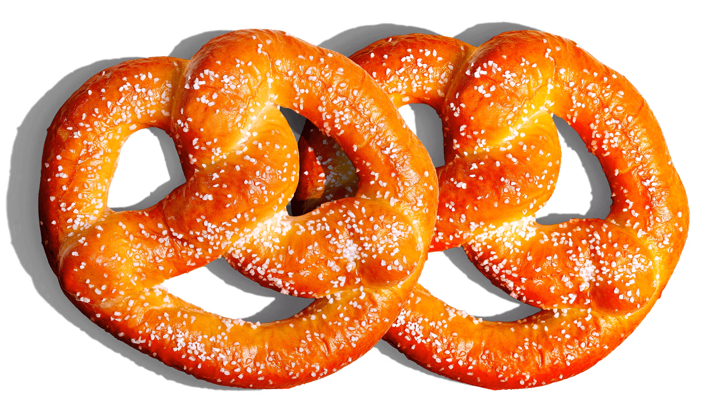 Two golden-brown salted pretzels on a black background.