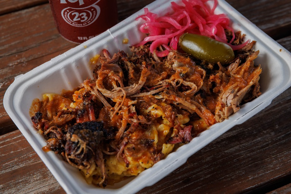 Pulled pork mac and cheese topped with pickled onions and jalapeño.