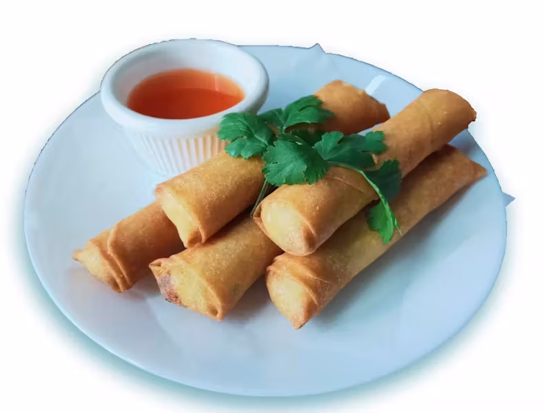 Golden-brown spring rolls with red dipping sauce and green garnish.