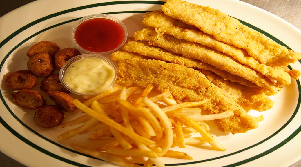 Fried fish fillets, French fries, and fried okra with dipping sauces.