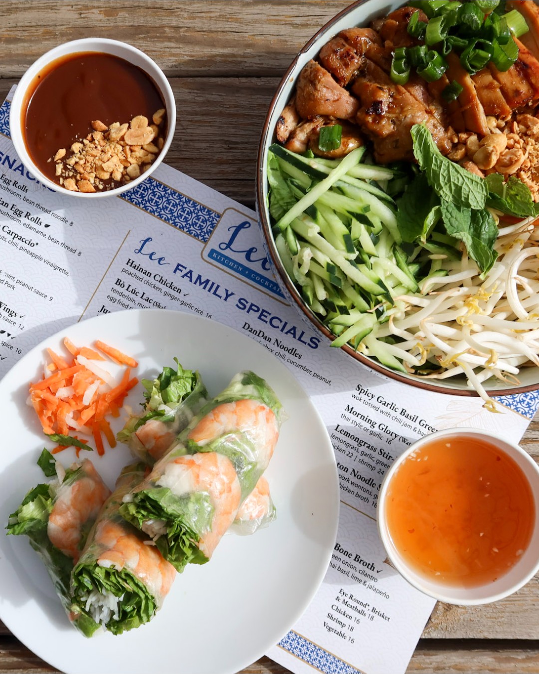 Vietnamese chicken noodle bowl, shrimp rolls, and dipping sauces.