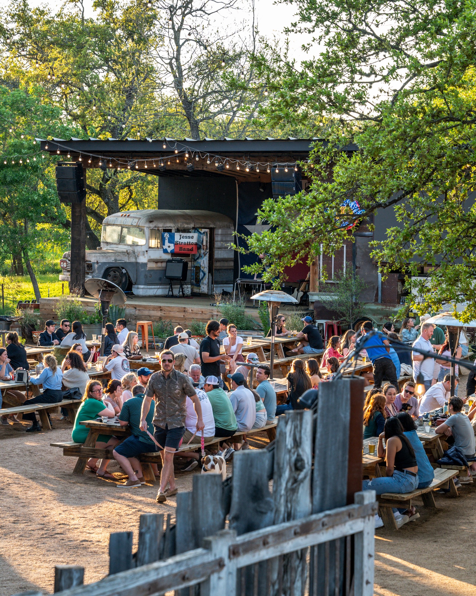 Crowd enjoying an outdoor concert by "Jesse Stratton Band" in Texas.