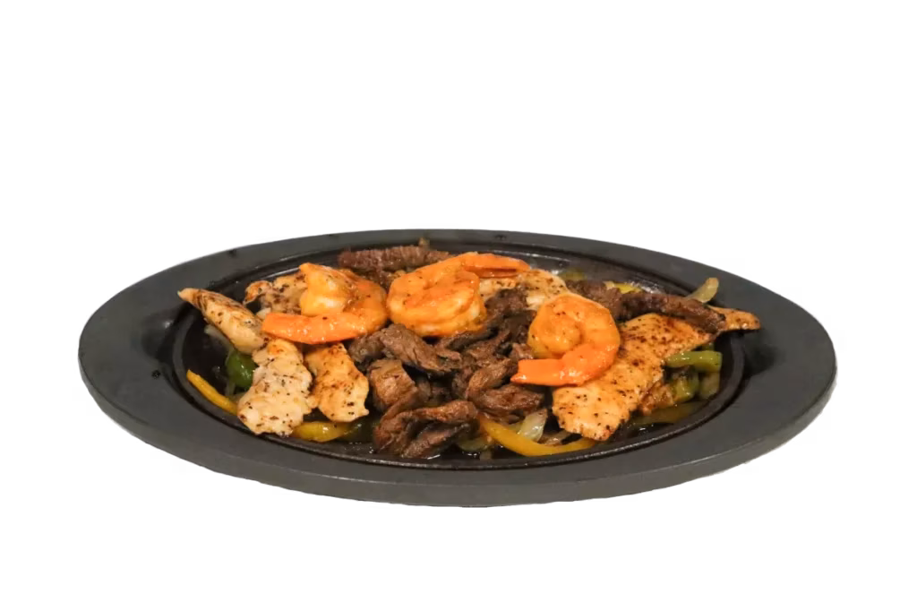 Grilled shrimp, chicken, and steak fajitas with peppers and onions.