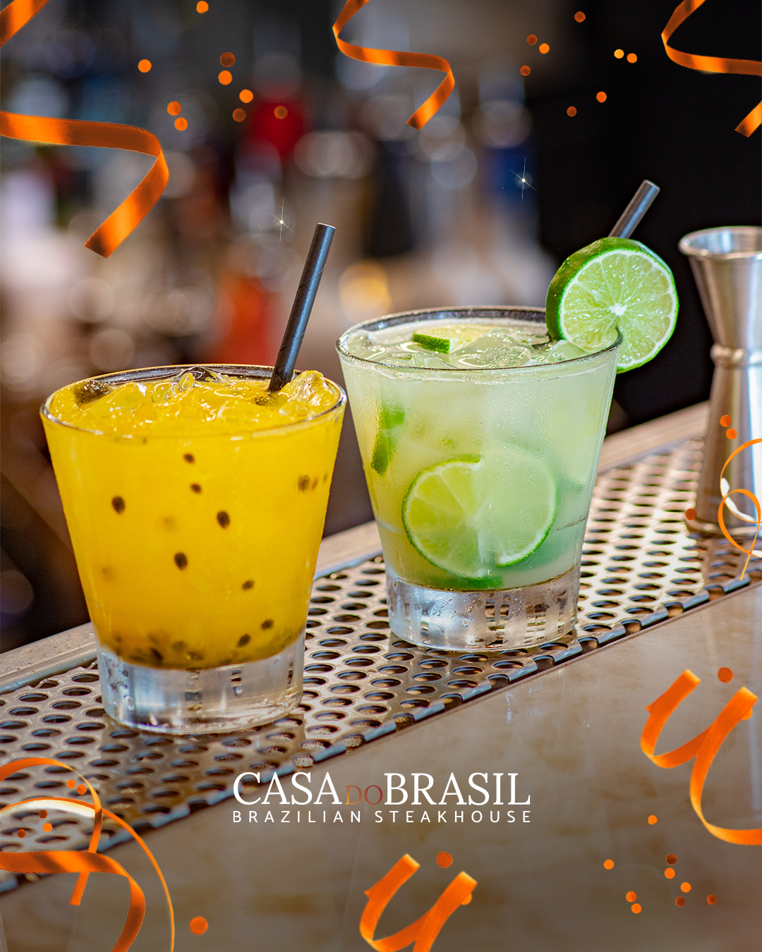 Two cocktails: yellow passion fruit and green lime on a bar.