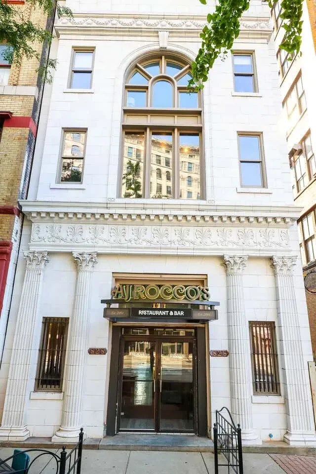 Ornate classical building exterior of AJ Rocco's Restaurant & Bar.