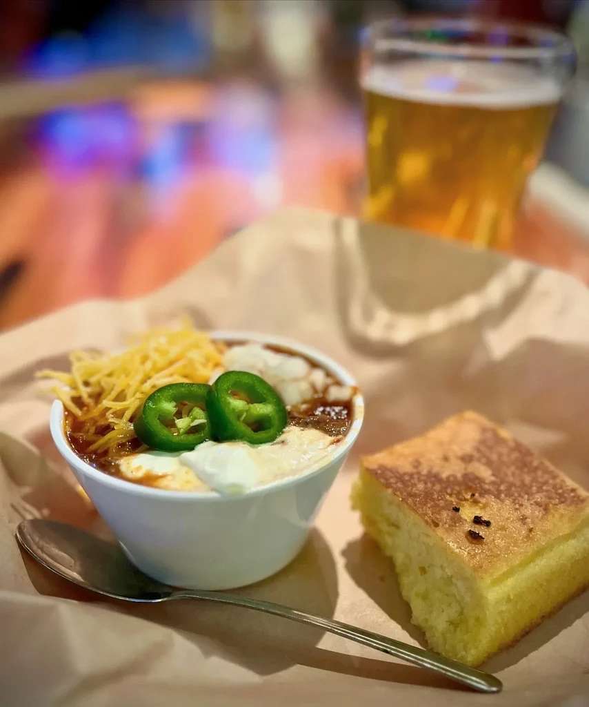 Chili topped with cheese, jalapeños, sour cream, served with cornbread.