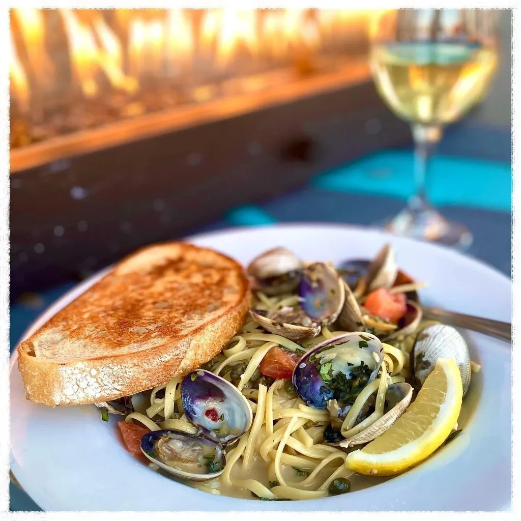 Linguine with clams, lemon, toasted bread, white wine, and fire.
