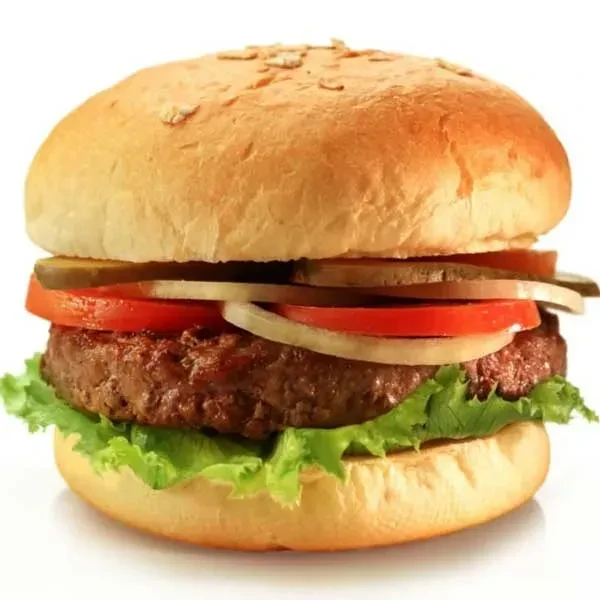 Hamburger close-up with char-grilled patty, lettuce, tomato, onion, pickle.