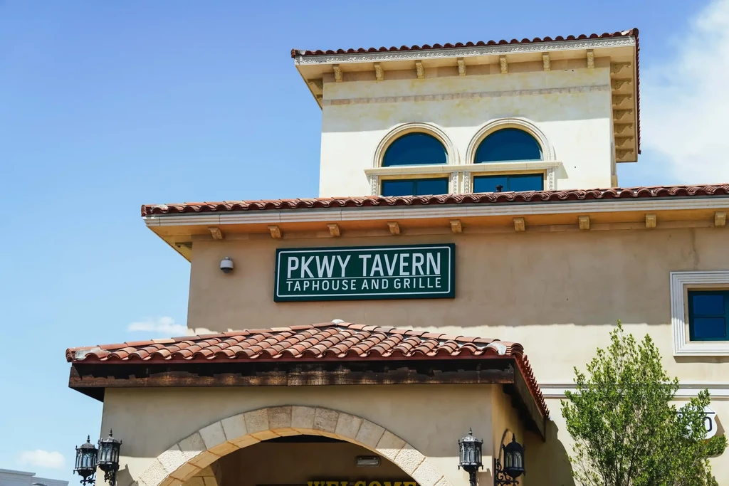 PKWY Tavern Taphouse and Grille: stucco building with terracotta roof.