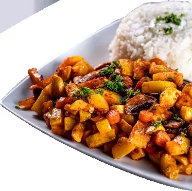 White plate with spiced diced vegetables, white rice, and herbs.