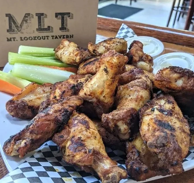 Crispy chicken wings, celery, carrots, dipping sauces, 'MLT' bag.