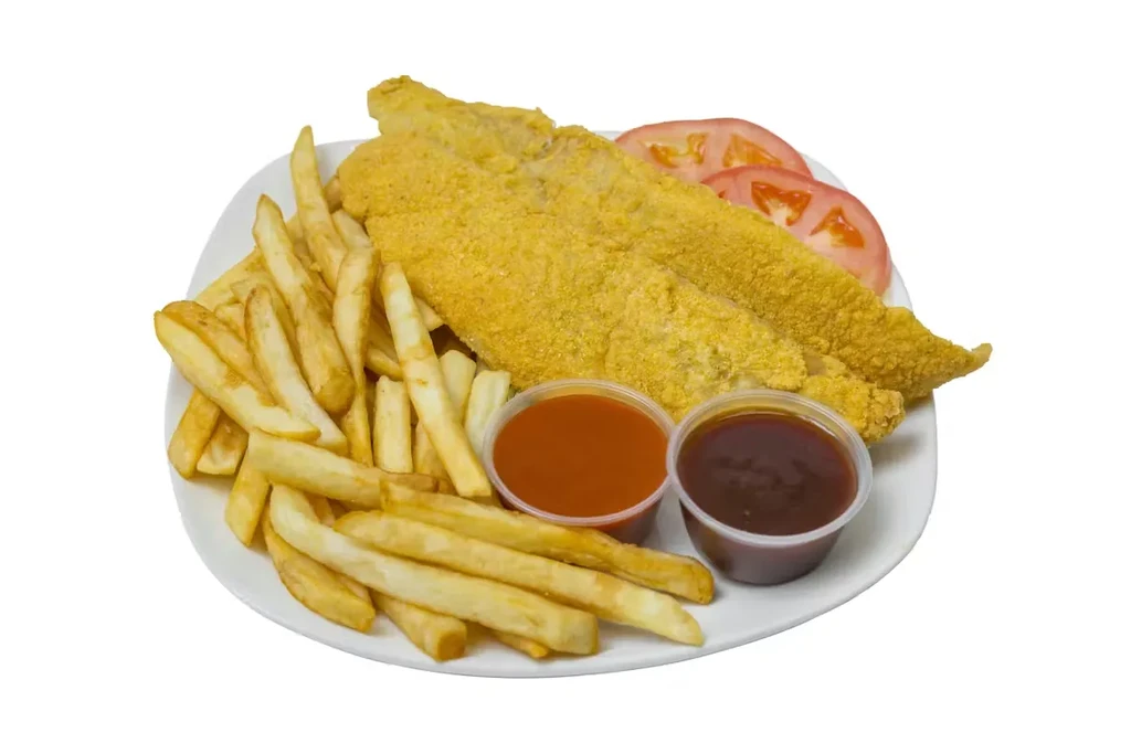 Fried fish and french fries with dipping sauces and tomato slices.