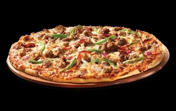 Pizza with meat, peppers, onion, and cheese on a wooden peel.