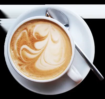 Top-down view of coffee in white mug with intricate latte art.
