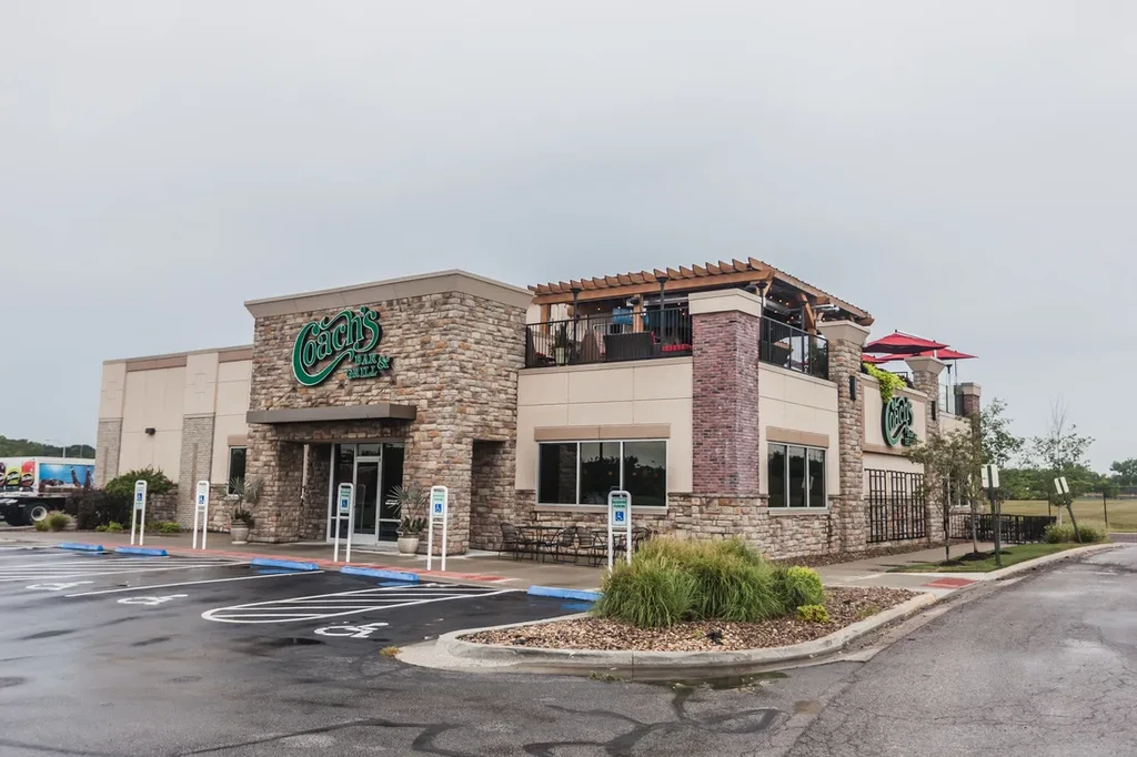 Modern Coach's Bar & Grill, upper patio, wet accessible parking.