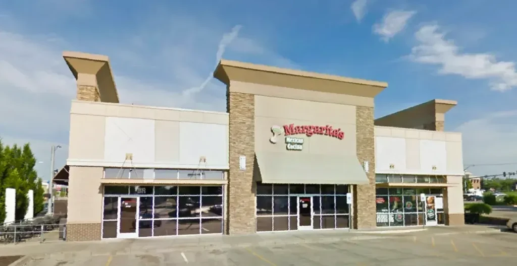 Modern commercial building housing Margarita's Mexican Cocina and other businesses.