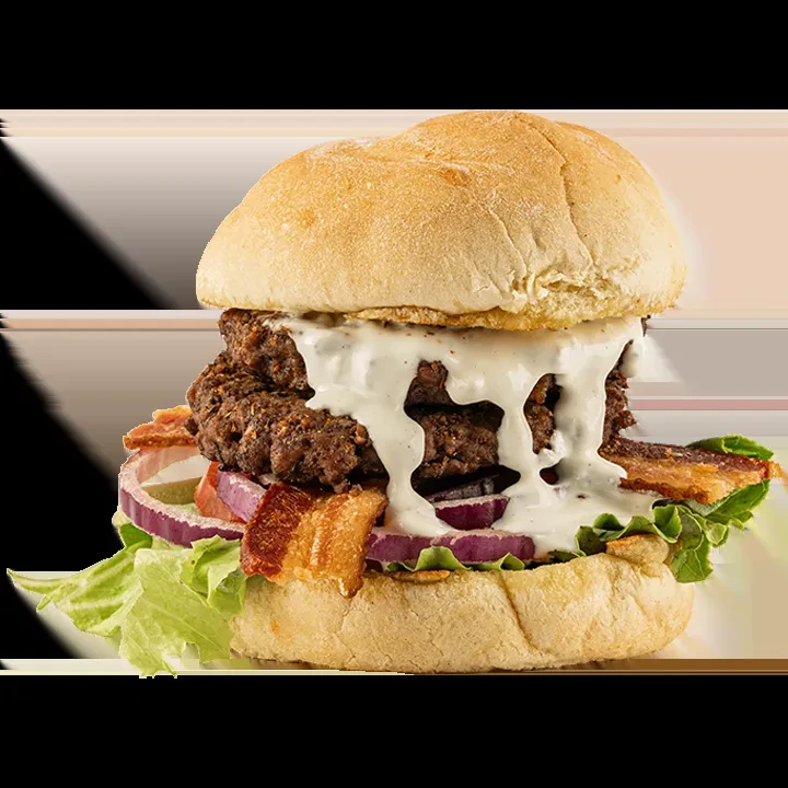 Double-patty burger, dripping white sauce, lettuce, onion, bacon, golden bun.