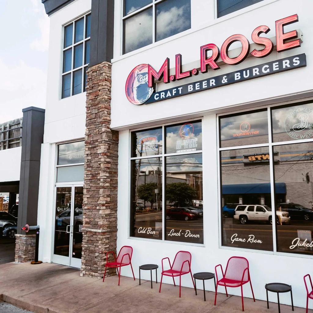 M.L. Rose Craft Beer & Burgers restaurant exterior with outdoor seating.