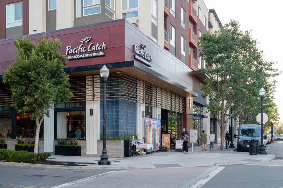Pacific Catch restaurant, a modern corner building in an urban setting.