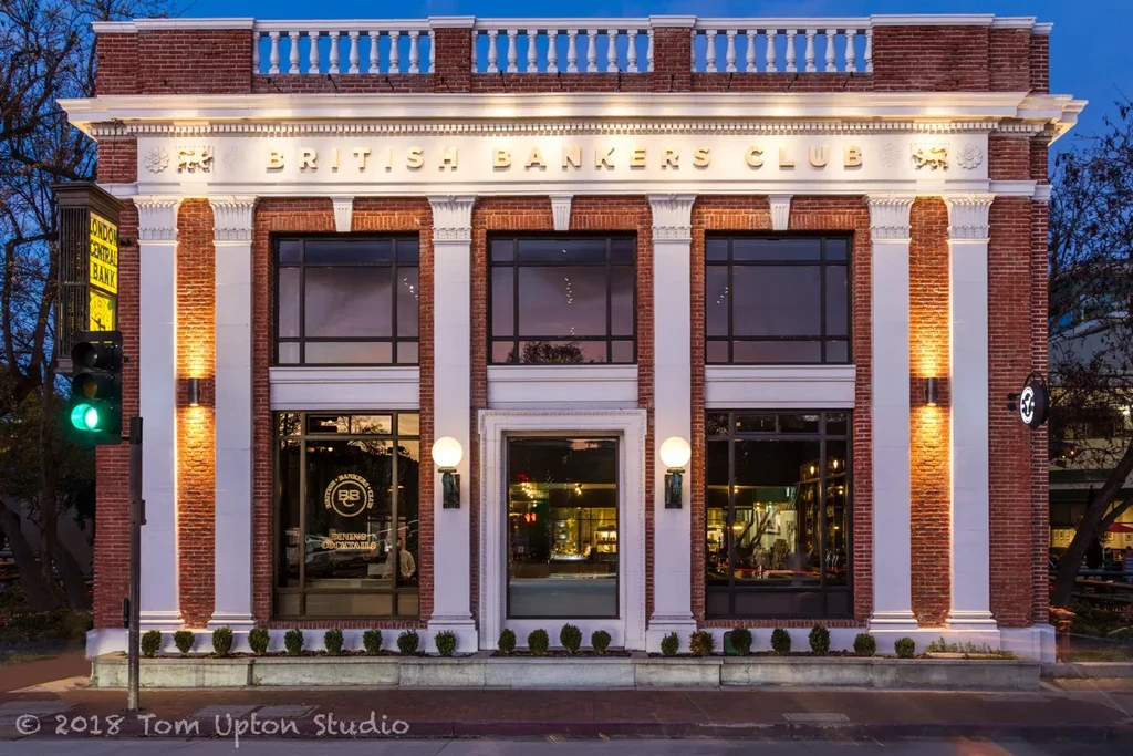 A brick building with "British Bankers Club" in gold lettering.