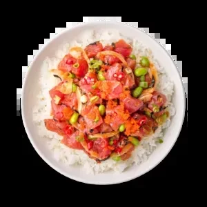 Colorful poke bowl with raw tuna, fish roe, edamame, and rice.