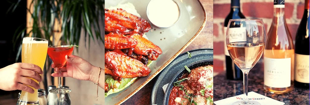 Close-up of drinks, chicken wings, and wine.