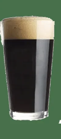 Dark stout beer in a pint glass with tan foam, green background.
