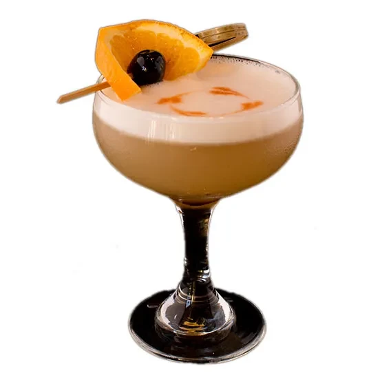 Chilled amber cocktail with foamy patterns, orange twist, and dark cherry.