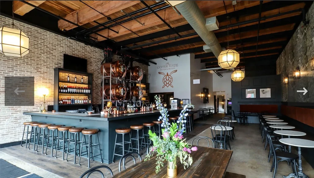 Modern, empty Copper Turtle Brewery and Gastro Bar interior.