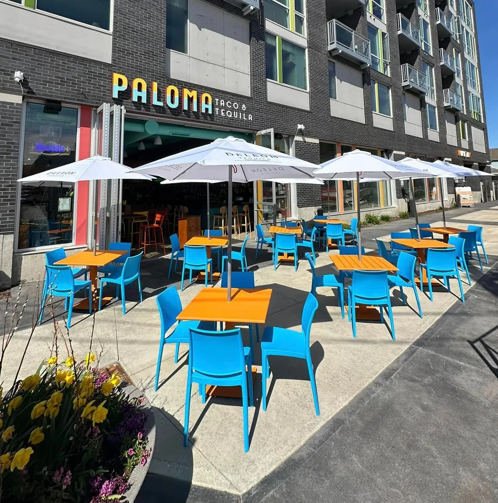Paloma Taco & Tequila restaurant exterior with colorful patio seating.