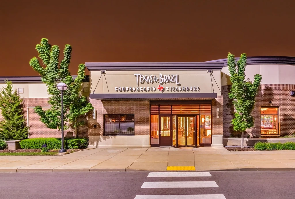 Texas de Brazil Churrascaria Steakhouse exterior illuminated at dusk.