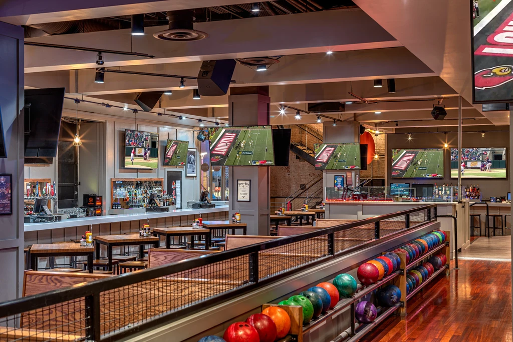 Spacious modern venue combining bowling, bar, dining, and sports TVs.